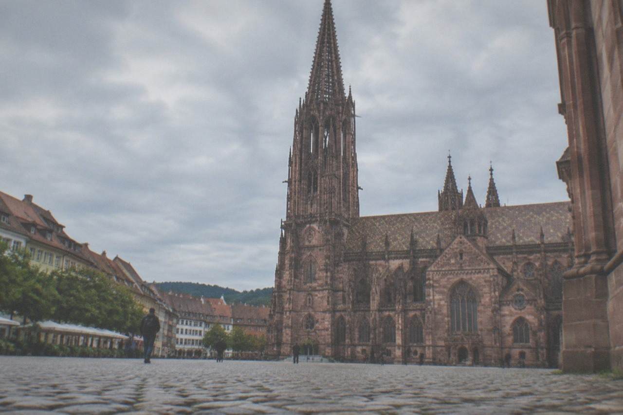 The Freiburg Münster rising above the red rooftops of the old town