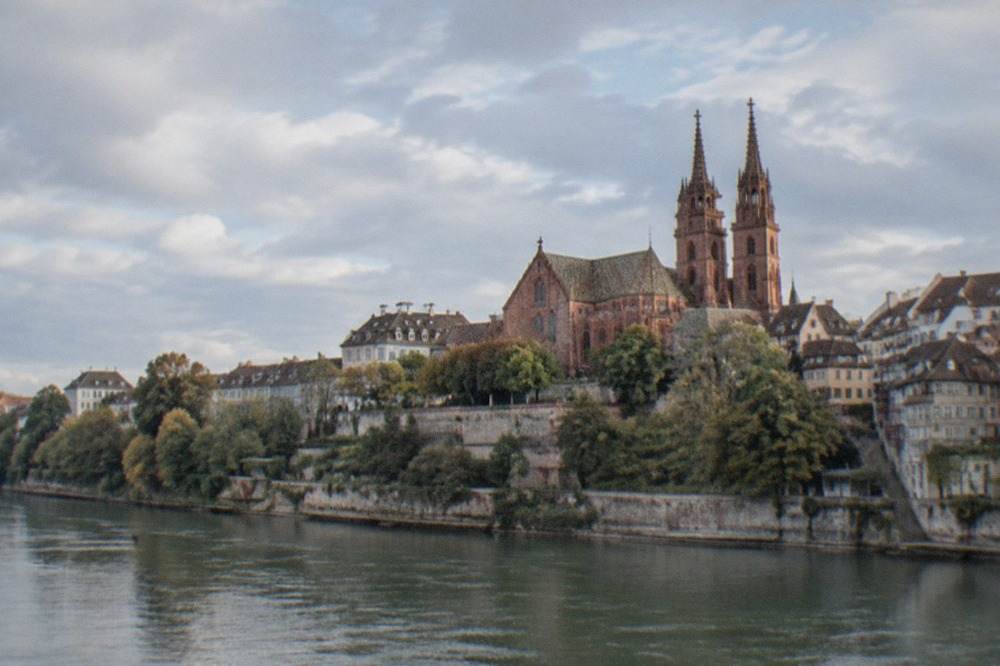 Basel's old town rooftops and the Minster seen from across the Rhine