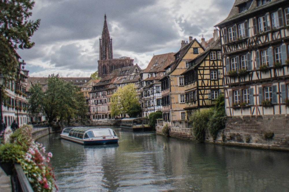 Canal boats and old timber-framed buildings in Strasbourg's Petite France district